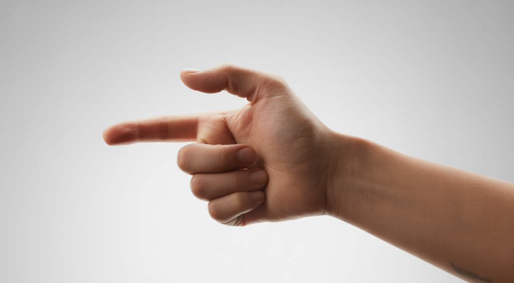 Close-up of a hand with a finger bent and appearing stiff, representing trigger finger
